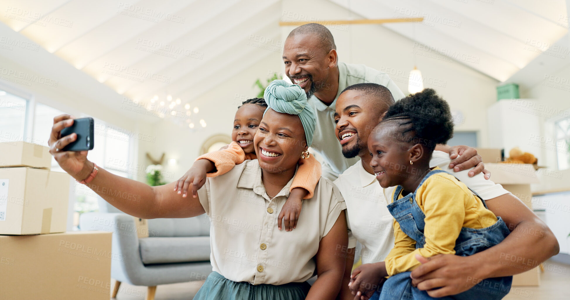 Buy stock photo Moving, happy family and selfie with kids in new home, boxes and people in living room of house. African mother, father and children in self portrait with boxes, real estate and happy investment.