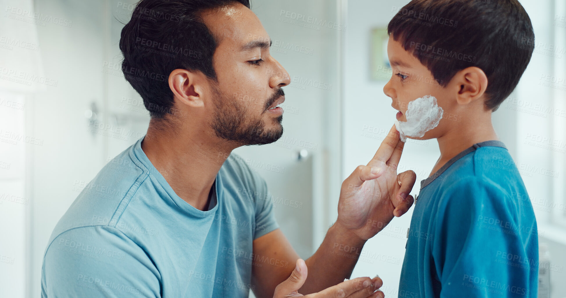 Buy stock photo Father, child and learning with shaving cream or teaching a boy a skincare, morning beauty routine and grooming in the bathroom. Shave together, son and dad helping with foam, razor and skin care