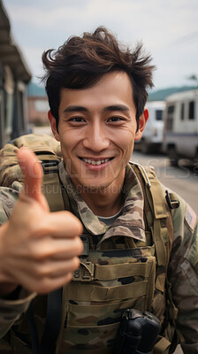 Buy stock photo Vertical selfie of happy asian soldier showing thumbs-up.