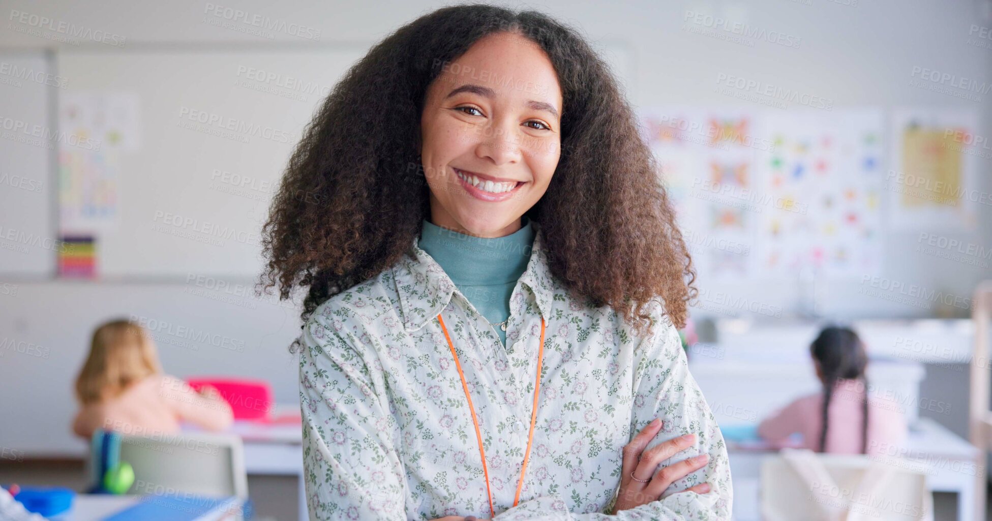 Buy stock photo Portrait, happy and a teacher arms crossed in a classroom for education during a lesson at school to study. Future, smile and children learning with a woman educator teaching a class of student kids