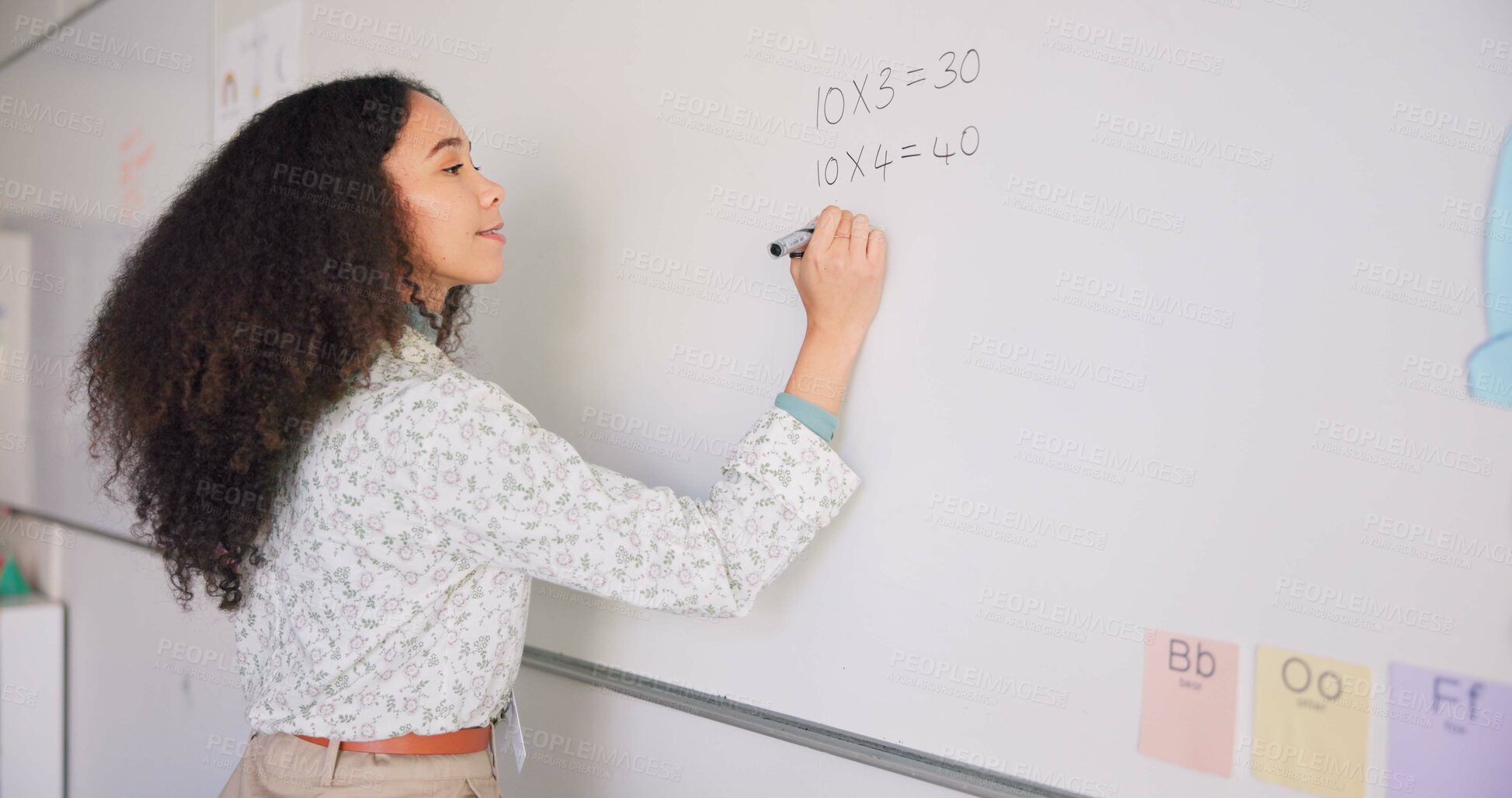 Buy stock photo Female teacher, writing and board for mathematics, study and happy for education career with presentation. Woman, classroom and learning expert with pen, problem or challenge for student development