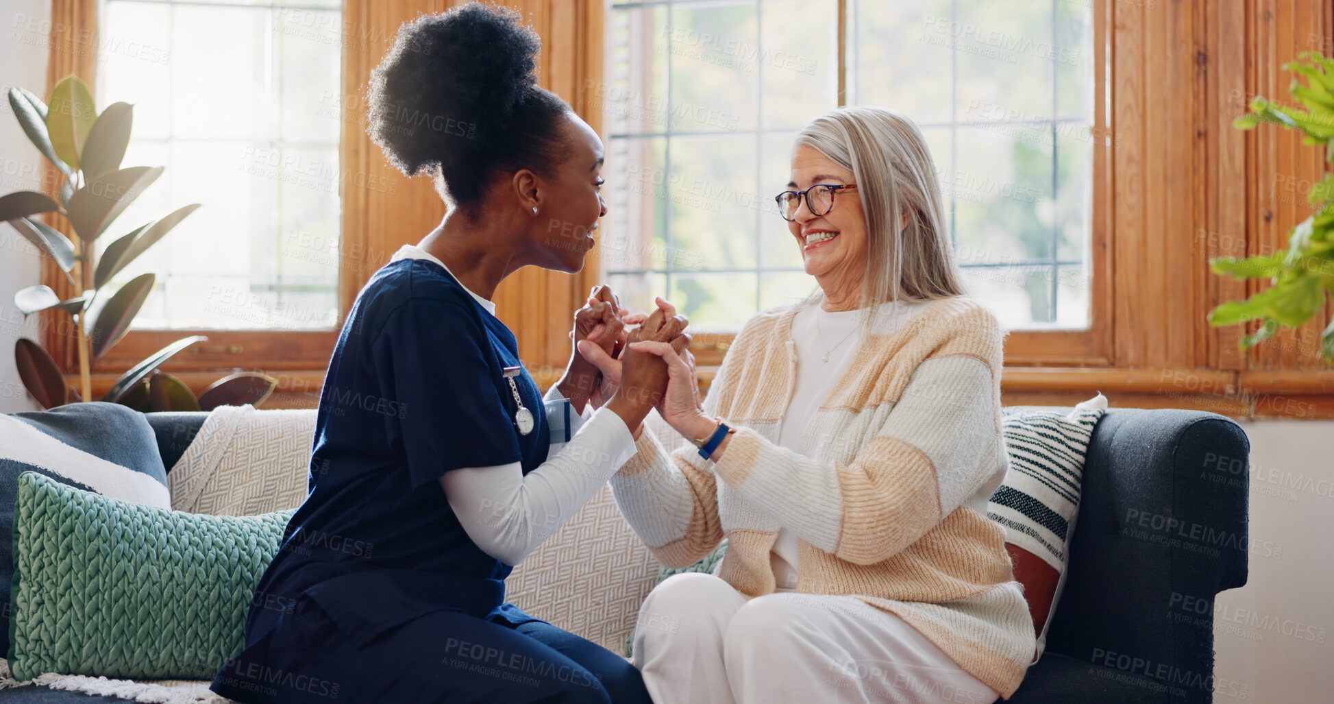 Buy stock photo Senior patient, funny or happy caregiver talking for healthcare support at nursing home clinic. Smile, women laughing or nurse speaking of joke to a mature person or woman in a friendly conversation