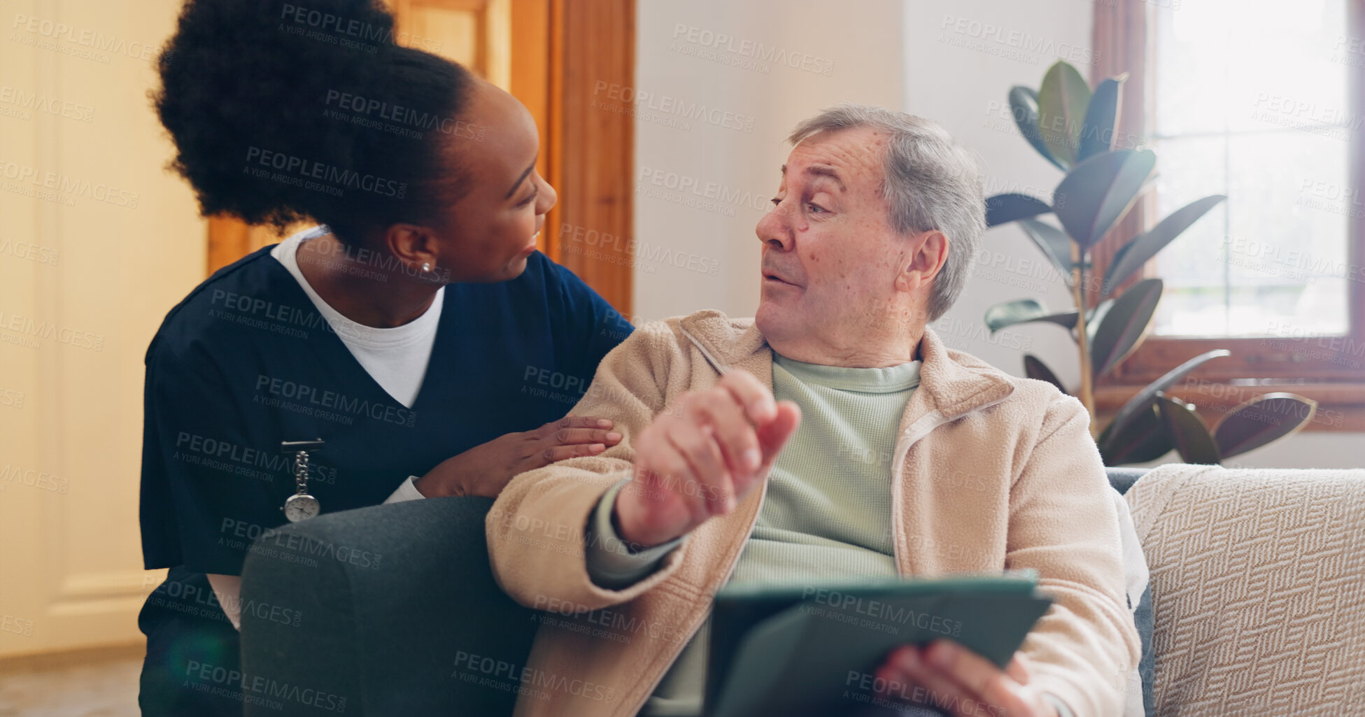 Buy stock photo Tablet, nurse and senior man on sofa browsing on internet for medical consultation research. Bonding, healthcare and black woman caregiver talking to elderly patient networking on technology at home.