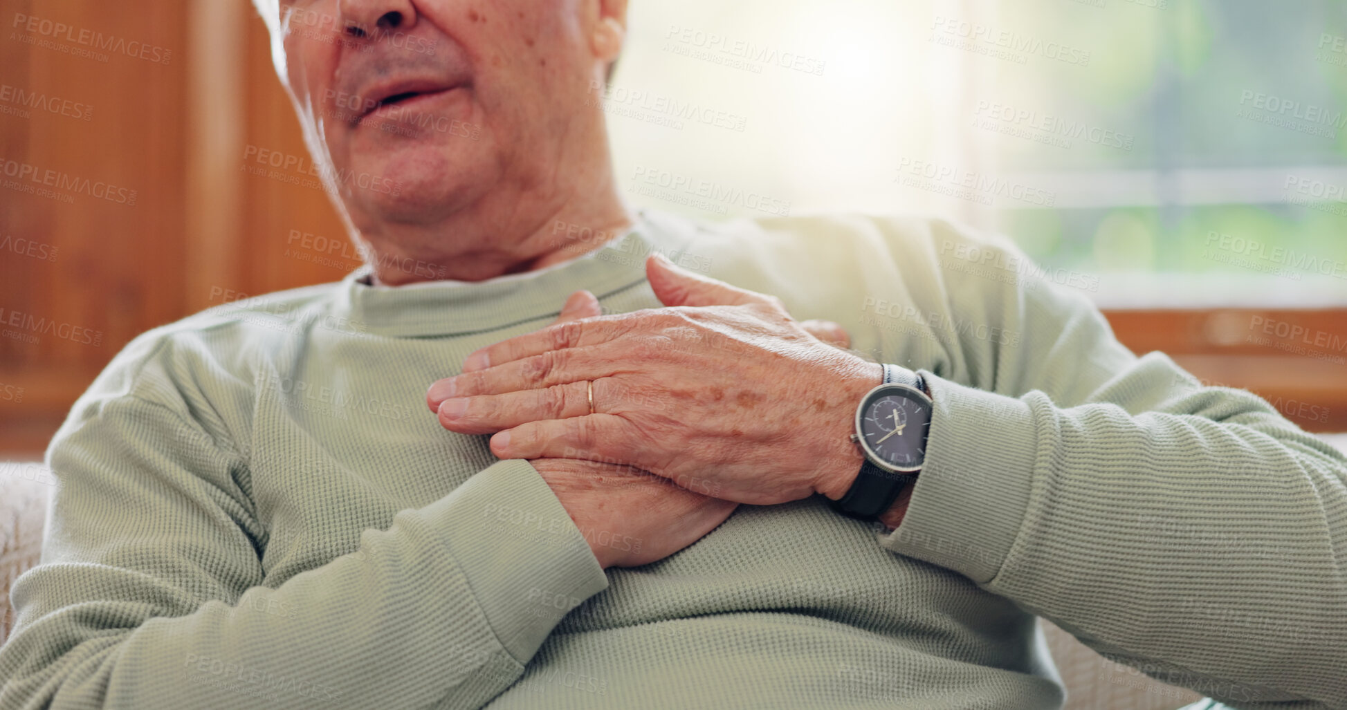 Buy stock photo Hands, heart attack or condition with a senior man in pain closeup in the living room of his retirement home. Healthcare, chest or cardiac arrest with an elderly person breathing for lung oxygen