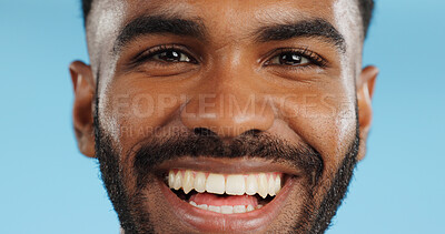 Happy, smile and face of black man in studio, blue background and mockup space with happiness or advertising. Portrait, closeup and marketing for skincare, wellness or healthy dermatology care