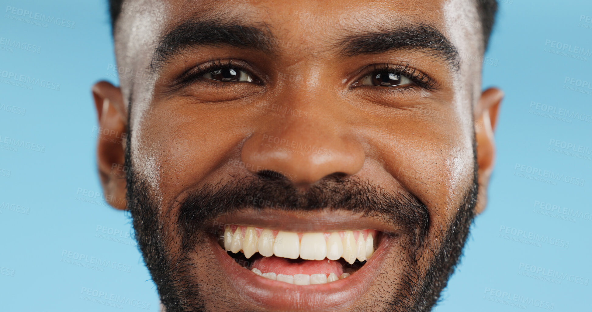 Buy stock photo Happy, smile and face of black man in studio, blue background and mockup space with happiness or advertising. Portrait, closeup and marketing for skincare, wellness or healthy dermatology care