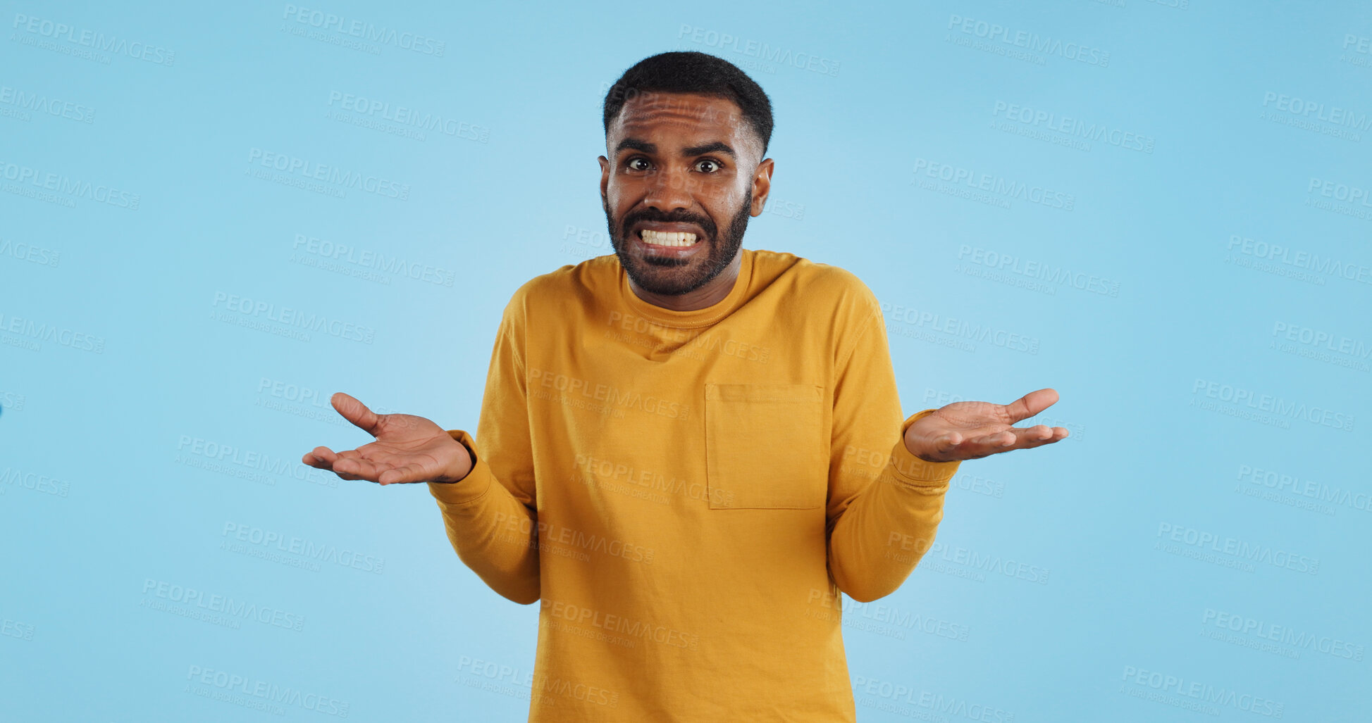 Buy stock photo Confused, hands and face of man in studio with don't know, gesture or ask on blue background. Why, portrait and guy model with oops, mistake or doubt, unsure or forget, guess or palm scale questions