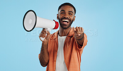 Buy stock photo Young man, megaphone and announcement, choice or broadcast for winner, join us or winning opportunity in studio. Face of african person with voice, pointing you and competition on a blue background