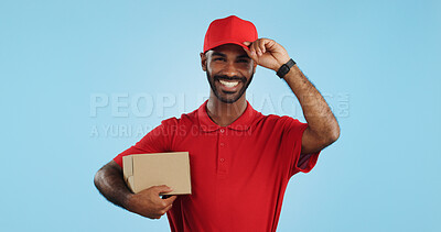 Buy stock photo Happy man, box and delivery in transport service, package or order in studio against a blue background. Portrait of male person or courier guy smile with parcel, cargo or logistics on mockup space