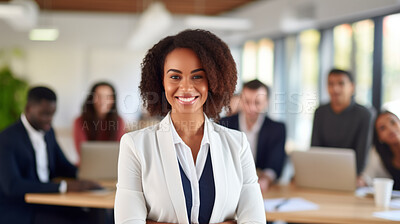 Portrait of an African American business woman. Happy woman posing in a boardroom