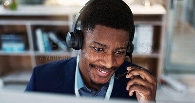 Happy black man, face and headphones in call center, customer service or telemarketing at office. Closeup of African male person, consultant or agent smile and talking for online advice at workplace