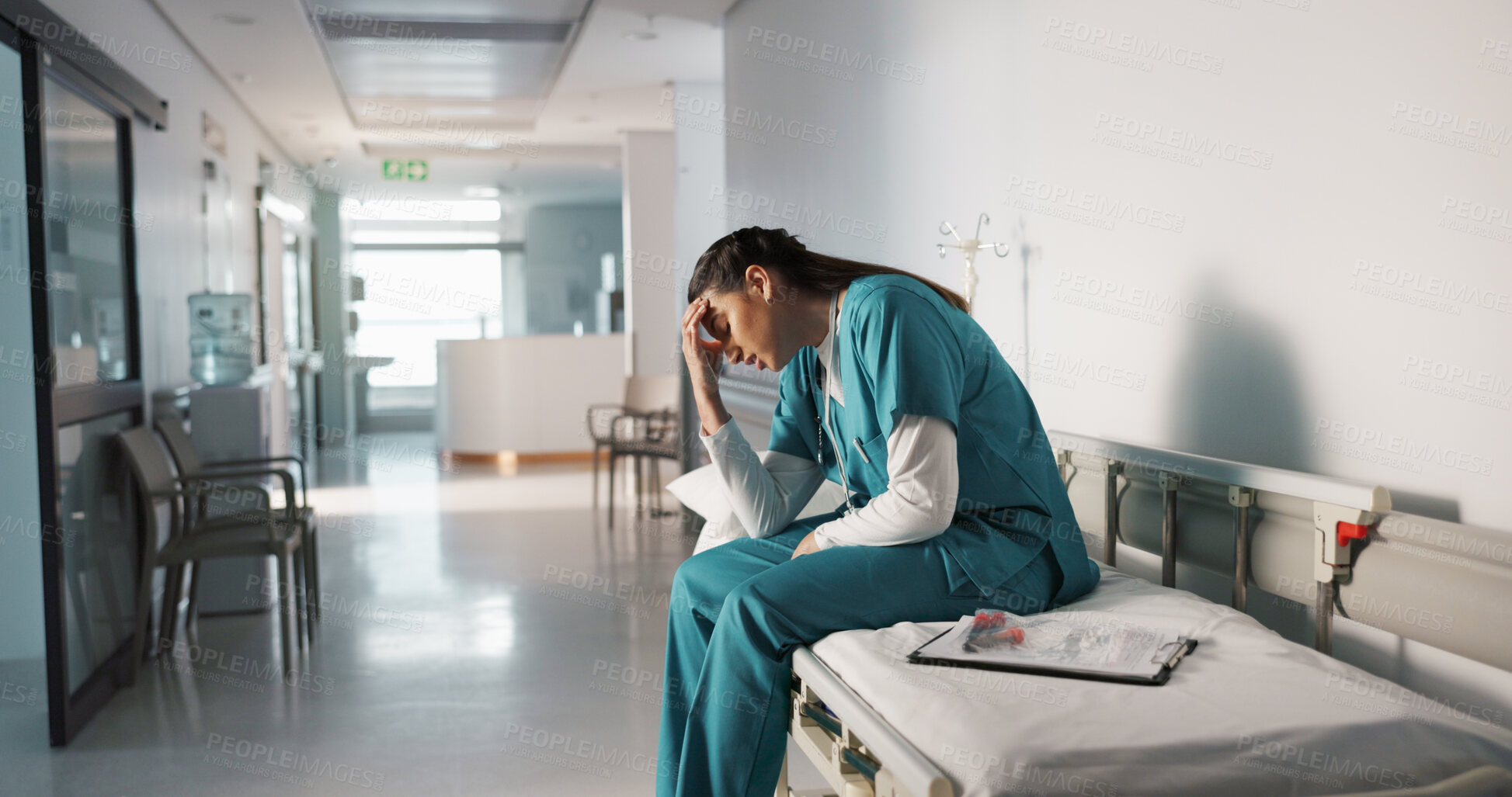 Buy stock photo Stress, sad and loss with a woman nurse in hospital after a fail, mistake or error in healthcare treatment. Depression, anxiety and grief with a young medicine professional in a medical clinic