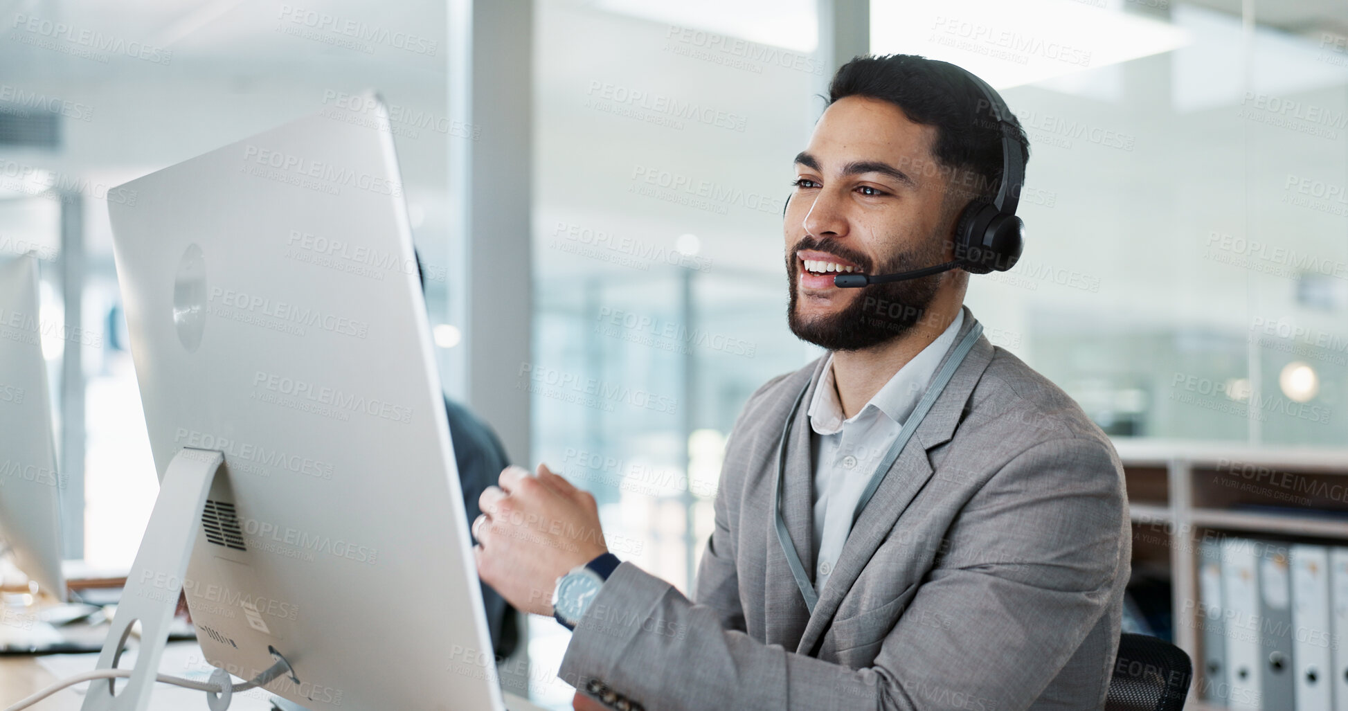 Buy stock photo Call center, customer service and man on an online consultation on a computer working in the office. Contact us, crm and young male telemarketing consultant or agent talking for support in workplace.