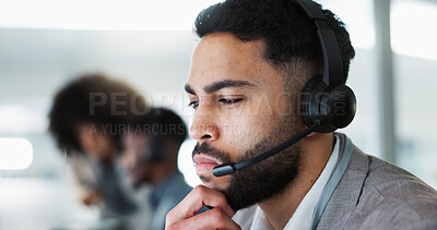 Employee, customer service and working in call center, thinking and Indian man with consulting. Receptionist, technology and communication with crm, corporate and telemarketing in office environment