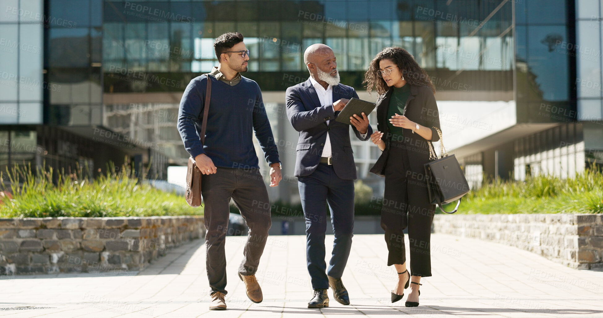 Buy stock photo Walking, talking and business people with a tablet in the city for planning, meeting or discussion. Teamwork, corporate and employees speaking with technology for a strategy, internet or email