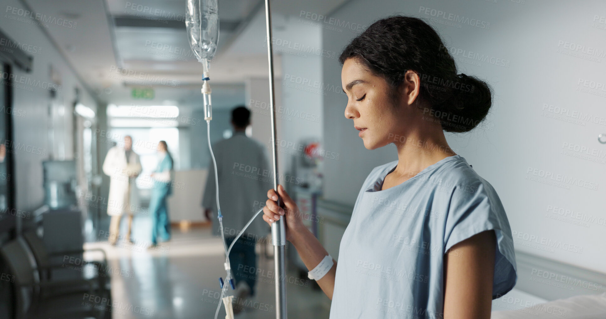 Buy stock photo Sad, healthcare and a woman with an iv drip at hospital for medicine, wellness and recovery from virus. Depression, thinking and a clinic patient with treatment stress, burnout or anxiety while sick