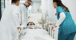 Doctors, patient and people push hospital bed, consulting and talking about healthcare service, wellness or surgery. Medical emergency, cooperation and hospital team, nurses or surgeon helping client