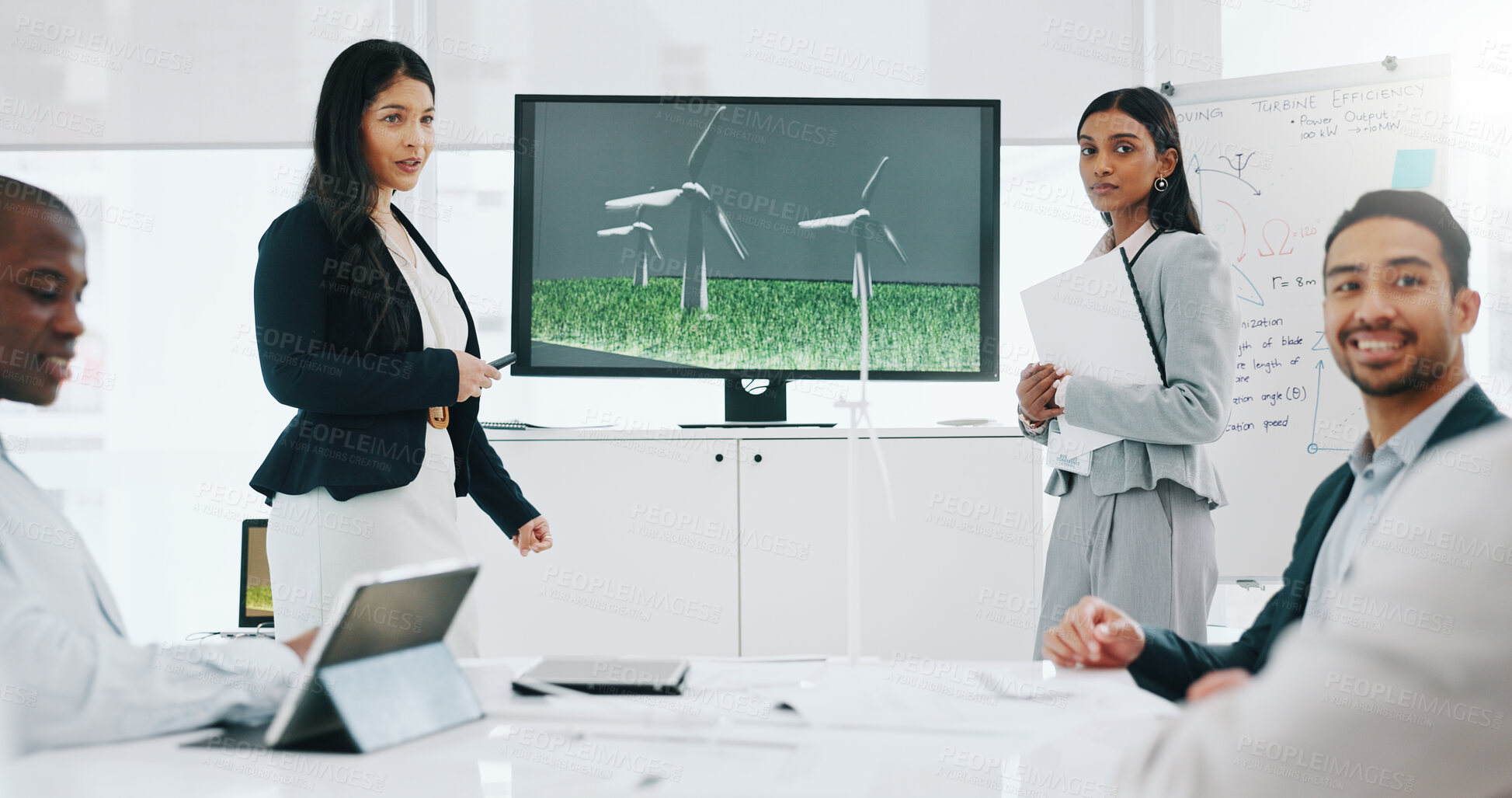 Buy stock photo Business woman, presentation and wind turbine for eco friendly, sustainability and renewable energy meeting. Engineering manager and people with windmill model, design and screen of agriculture farm