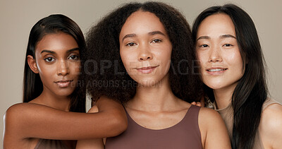 Diversity, beauty and face of women in studio for empowerment, wellness and skincare. Inclusion, friends and portrait of group of people for dermatology, natural skin and support on brown background