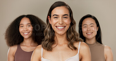 Beauty, diversity group and woman smile for facial cosmetics, self care wellness or dermatology makeup. Women empowerment, unique and happy portrait of model friends together on studio background