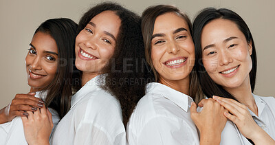 Women, group skincare and beauty with love, hug and support in diversity and inclusion on brown studio background. Friends, model or people smile together and kiss in dermatology, skin care or makeup