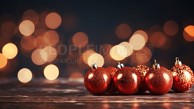 Red, gold noel on table against background. Golden bokeh. Christmas concept.