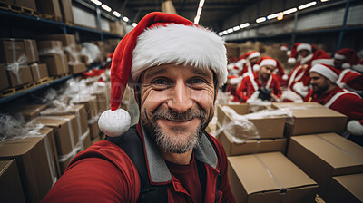 Buy stock photo Selfie of happy volunteer or worker in warehouse. Wearing christmas caps smiling.