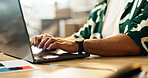 Man, laptop and hands typing for communication, email or online research on desk at office. Closeup of male person working on computer for networking, planning or web search on table at workplace