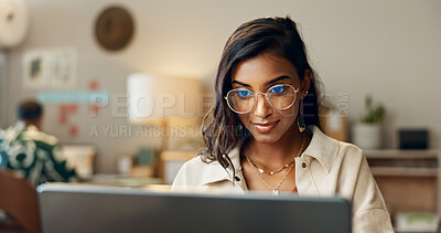 Buy stock photo Business, woman and reading on laptop in office for research, feedback and supply chain for business. Indian, person and typing on pc for logistics, stock administration or package distribution data