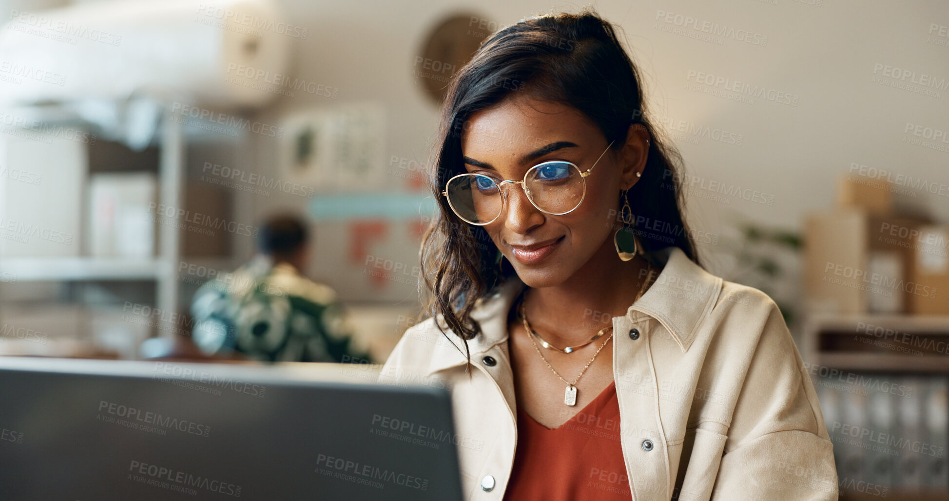 Buy stock photo Woman, business and reading on laptop at work for research, feedback and supply chain for business. Indian, person and planning on pc for logistics, stock administration or package distribution data