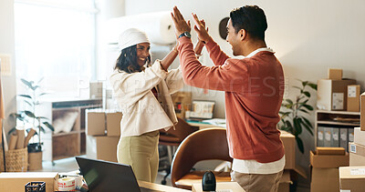 Happy people, high five and teamwork in small business or logistics together at boutique. Man and woman touching hands in celebration for team achievement, winning or sale at retail store or shop