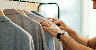 Buy stock photo Man, suit and clothes rack in shop for search, check sale or decision on in shopping mall. Person, fabric and hands with choice, discount or thinking in retail customer experience in fashion boutique