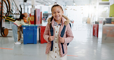 Young, child and museum with happy portrait for education, kindergarten and kid learning with toys. Girl, student and face with smile to study, develop or excited for science play for problem solving