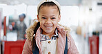 Portrait, girl and child with education for science, convention or exhibition with smile and backpack. Face, student and kid with happiness at scientific tradeshow, workshop or academy for knowledge