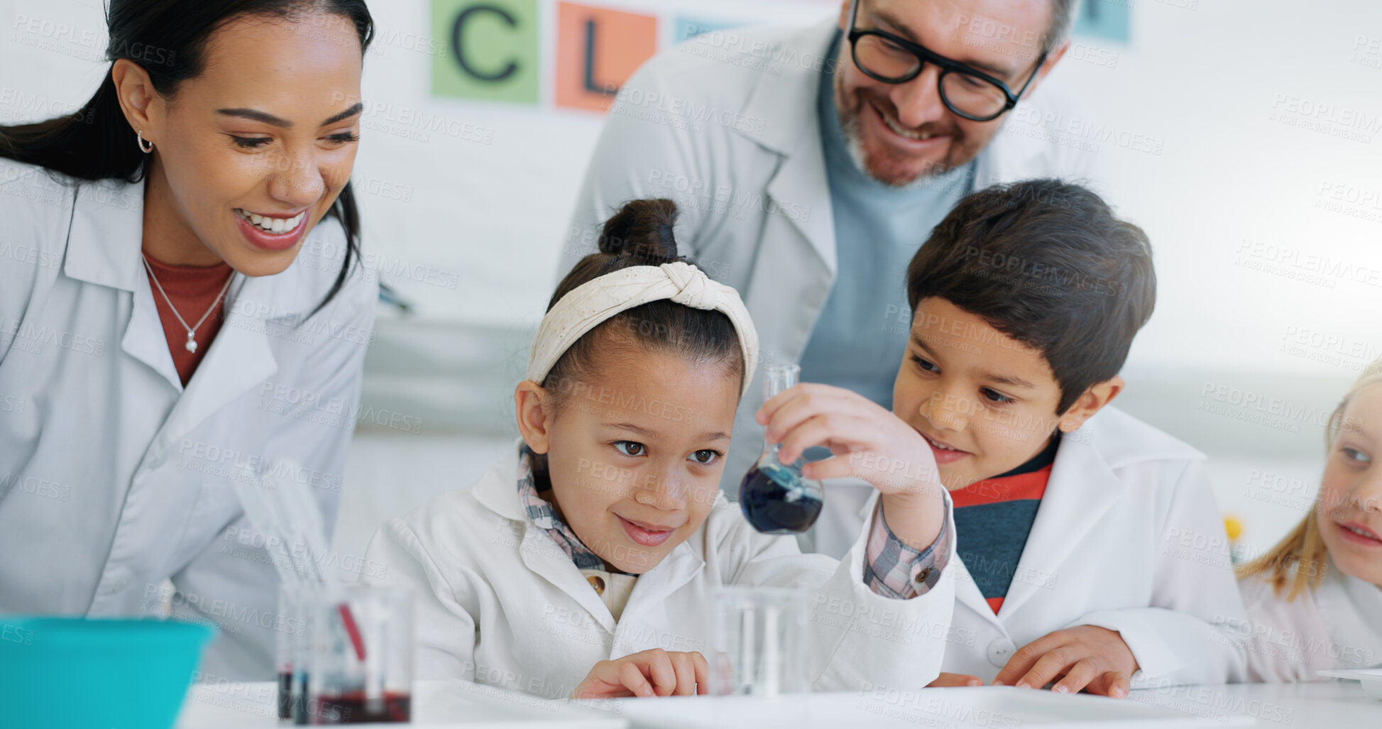 Buy stock photo Science, education and students in a classroom with their teachers for learning or to study chemistry. Children, school and scholarship with kids in a lab for an experiment of chemical reaction