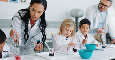 School kids, science and class with teacher, lab and learning information with experiment for knowledge. Children, boy and girl with education, scientist or scholarship for innovation in laboratory