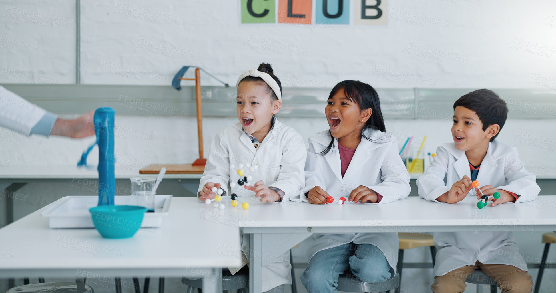 Buy stock photo School kids, science club and happy for learning, wow and excited for information, experiment or knowledge. Children, boy and girl with education, volcano or scholarship for innovation in laboratory