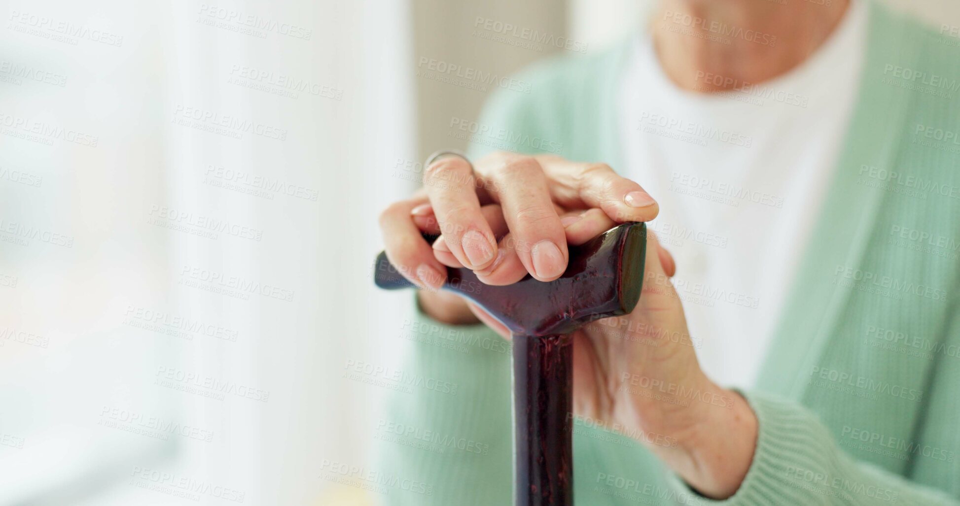 Buy stock photo Cane, retirement and support with hands of old woman for cancer, medical and person with a disability. Rehabilitation, healthcare and walking stick with closeup of person in nursing home for balance