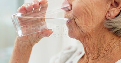 Thirsty, closeup and senior woman drinking water for hydration and liquid diet detox at home. Wellness, health and calm elderly female person enjoying glass of cold drink in modern retirement house.