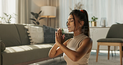 Buy stock photo Woman, yoga and meditation with praying hands in living room for zen, mental health and healthy at home. Indian, person or breath with peace to relax, chakra training and spiritual wellness on floor