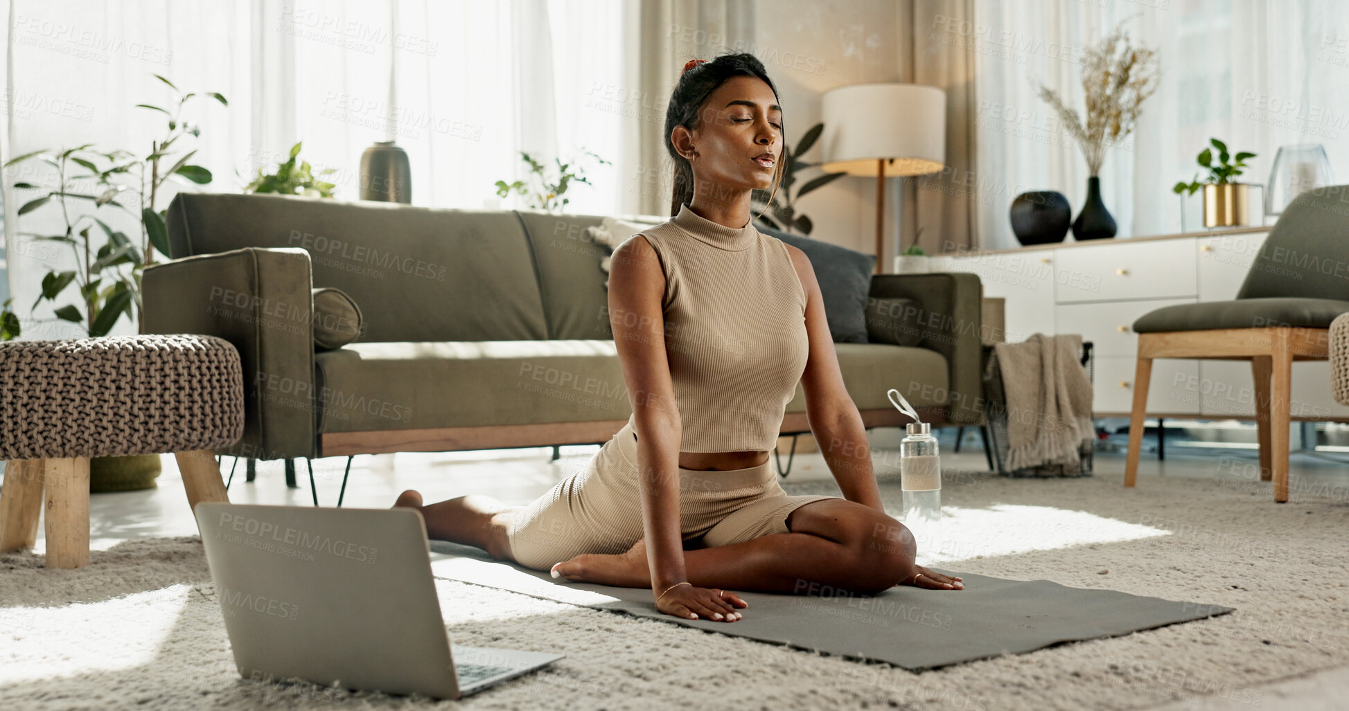 Buy stock photo Yoga, online class and woman stretching in home on the floor in living room with peace in apartment. House, exercise and girl workout with webinar on computer for zen mindfulness and mental health