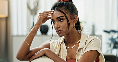 Buy stock photo Depression, woman and thinking in home of pain, mental health and anxiety of debt, challenge or mistake. Stress, doubt and confused indian girl with headache of trauma, broken heart or burnout crisis