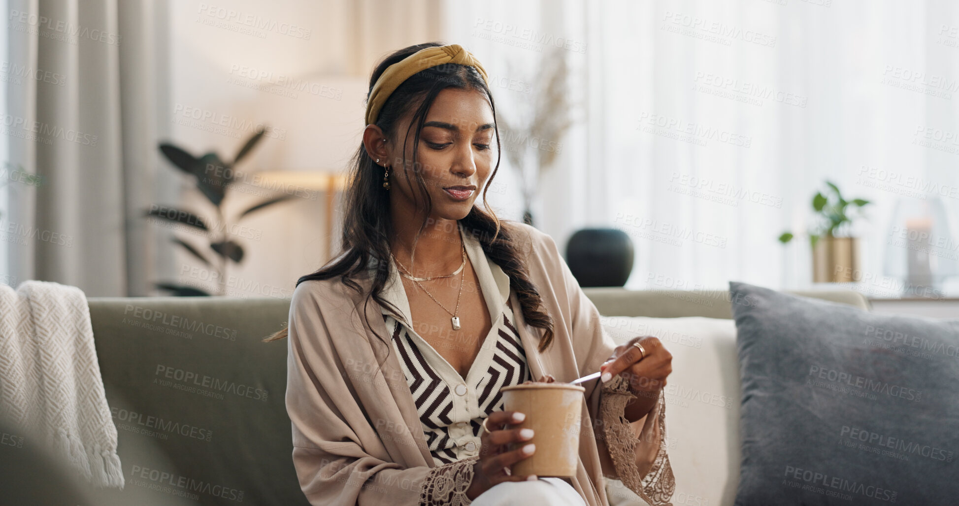Buy stock photo Woman, eating ice cream and home on sofa, thinking or idea for dessert, sweets or relax in living room. Girl, gelato or frozen yogurt for snack, lounge couch and house with memory, choice or decision