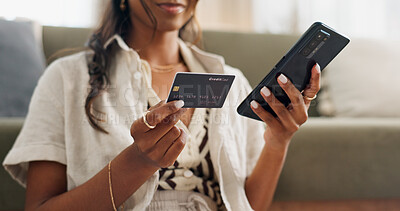Woman, hands and phone with credit card for online shopping, payment or transaction in living room at home. Closeup of female person or shopper on mobile smartphone with debit for ecommerce at house