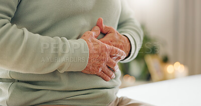 Buy stock photo Hands, stomach pain with closeup and gut health, person has digestion issue and nutrition with elderly care. Sick, colon and gas with healthcare and wellness, help and support for stress and illness