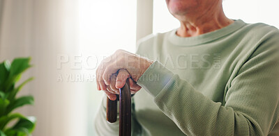 Hands, old person with disability and walking stick, closeup with wellness and retirement. Senior care, cane to help with balance and support, Parkinson disease or arthritis, sick and health issue
