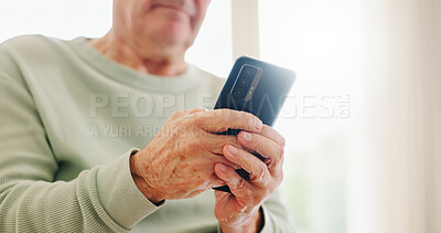 Buy stock photo Home, closeup and senior hands with a cellphone, typing and connection with social media, digital app and contact. Old man, pensioner or mature guy with a smartphone, mobile user and search internet