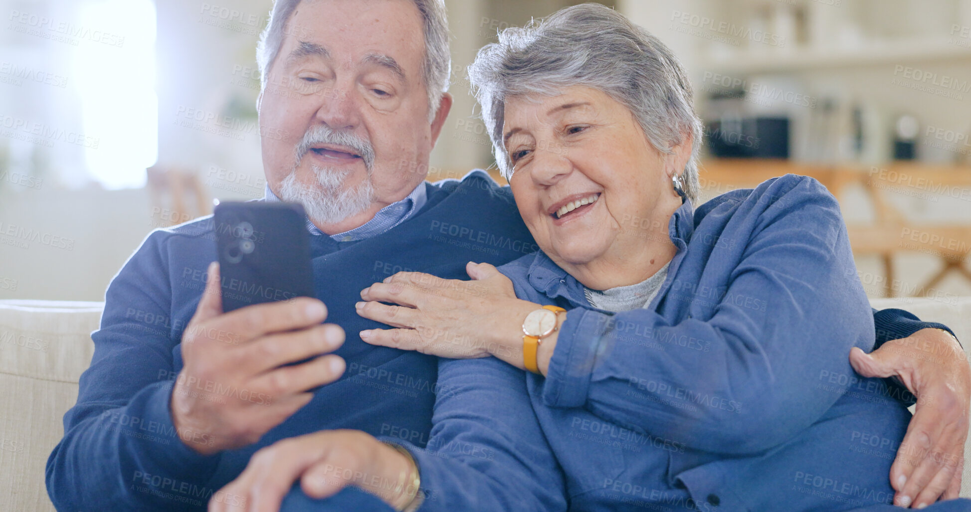 Buy stock photo Home, typing and senior couple with smartphone, love and connection with social media, speaking and post. People, mature man and old woman with cellphone, online reading and website information