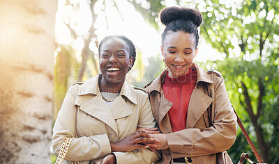 Business women, friends and street with laugh, conversation and walking together in park, sunshine or holding hands. African employees, outdoor and happy by trees for comic gossip, funny joke or chat