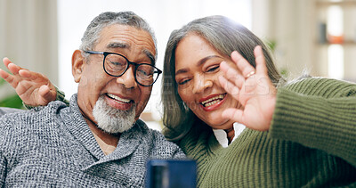 Buy stock photo Senior couple, video call and phone on sofa with wave hello, smile and communication on web in home living room. Elderly lady, old man and happy for contact, live streaming and chat on social media